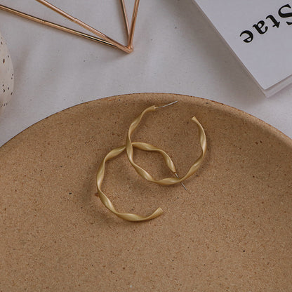 Copper Plated Gold Eearrings Presented by Furniffy™